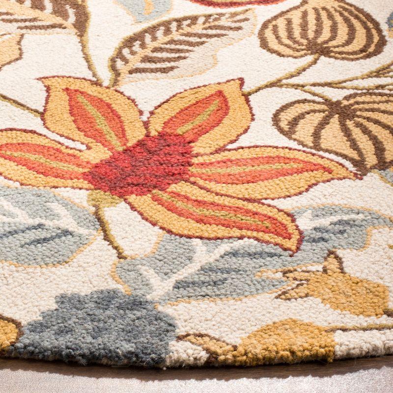 Blossom BLM863 Hand Hooked Area Rug - Ivory/Multi - 6' Round - Safavieh.