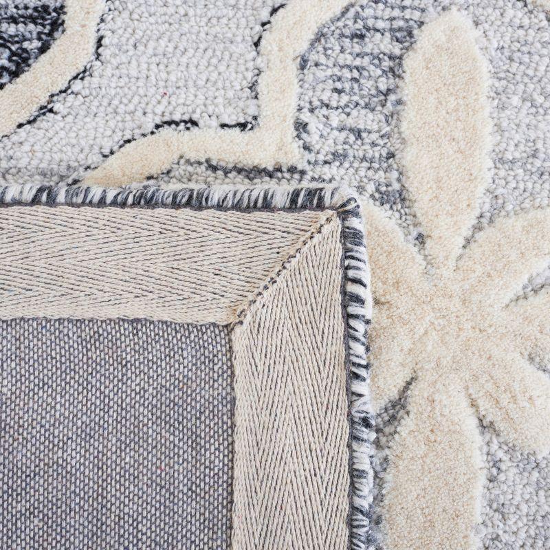 Metro MET872 Hand Tufted Area Rug - Black/Ivory - 6'x6' - Safavieh.