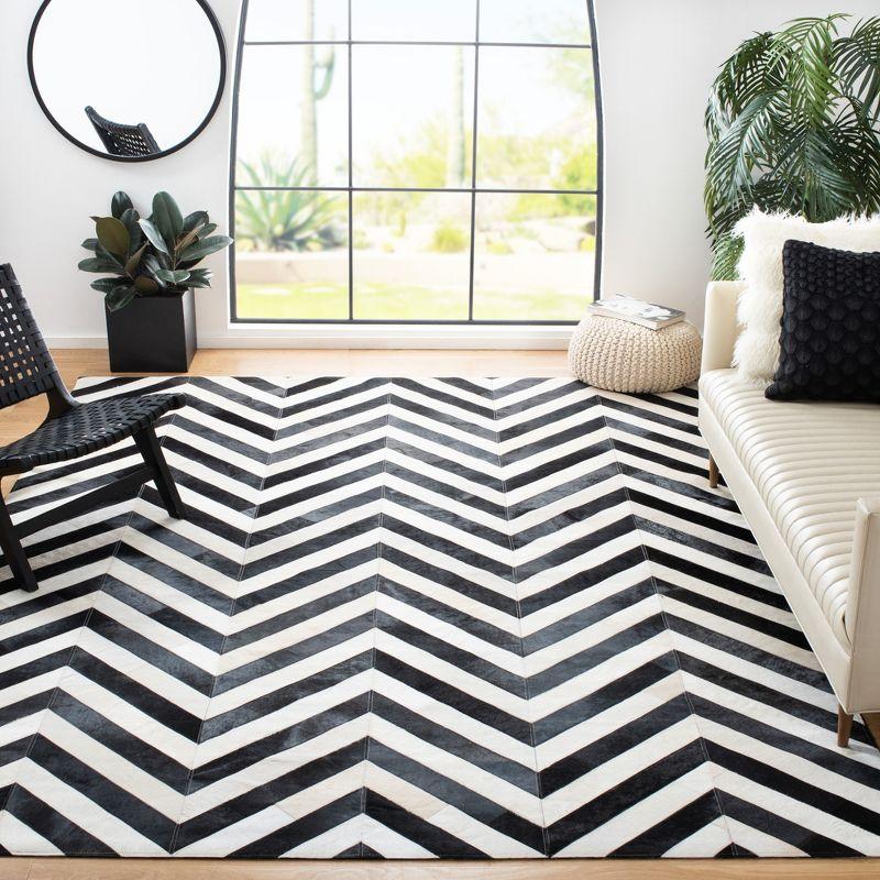 Hand-Knotted Geometric Black and White Cowhide Area Rug 5' x 8'