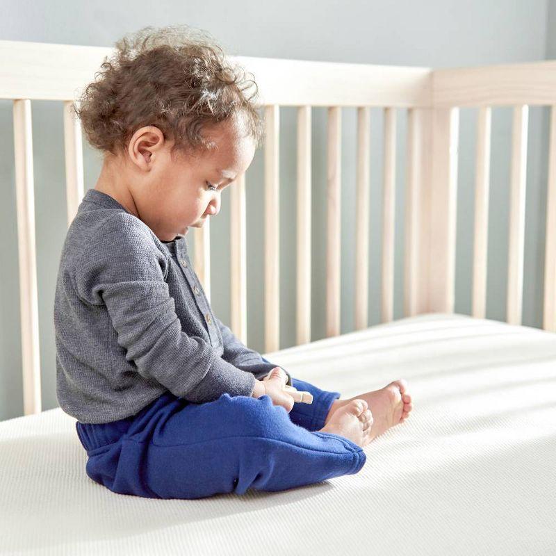 Naturepedic Organic Cotton Breathable 2-Stage Crib Firm Mattress with Waterproof Breathable Pad