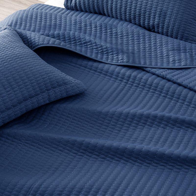 Great Bay Home Detailed Channel Stitch All-Season Reversible Quilt Set With Shams (King, Navy)