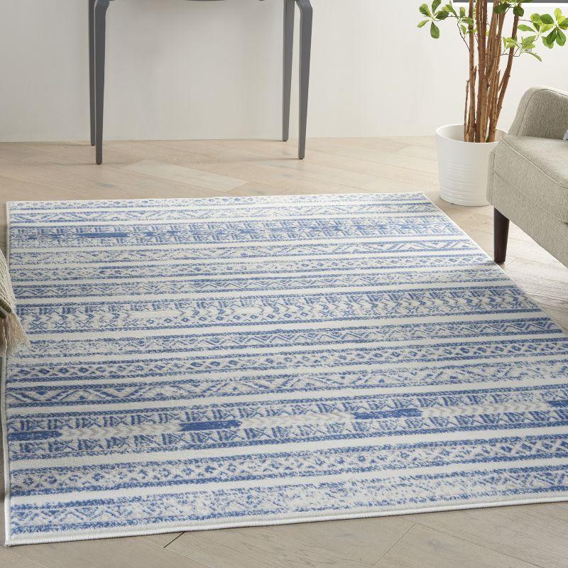 Ivory Blue Geometric Synthetic 6' x 9' Easy-Care Area Rug