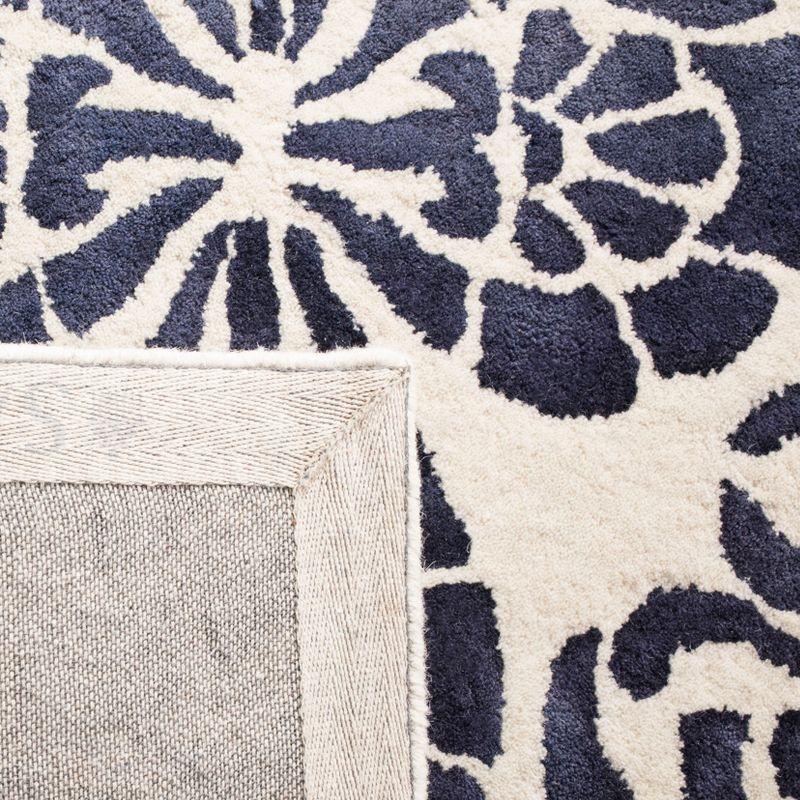 Dip Dye DDY719 Hand Tufted Area Rug - Ivory/Navy - 8'x10' - Safavieh.