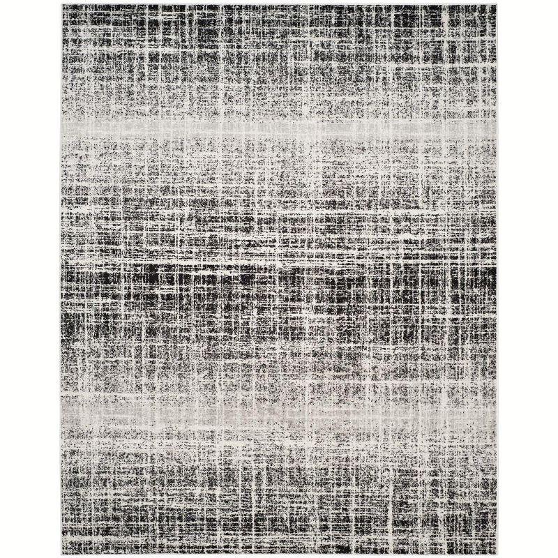 Ivory and Black 8' x 10' Synthetic Abstract Area Rug