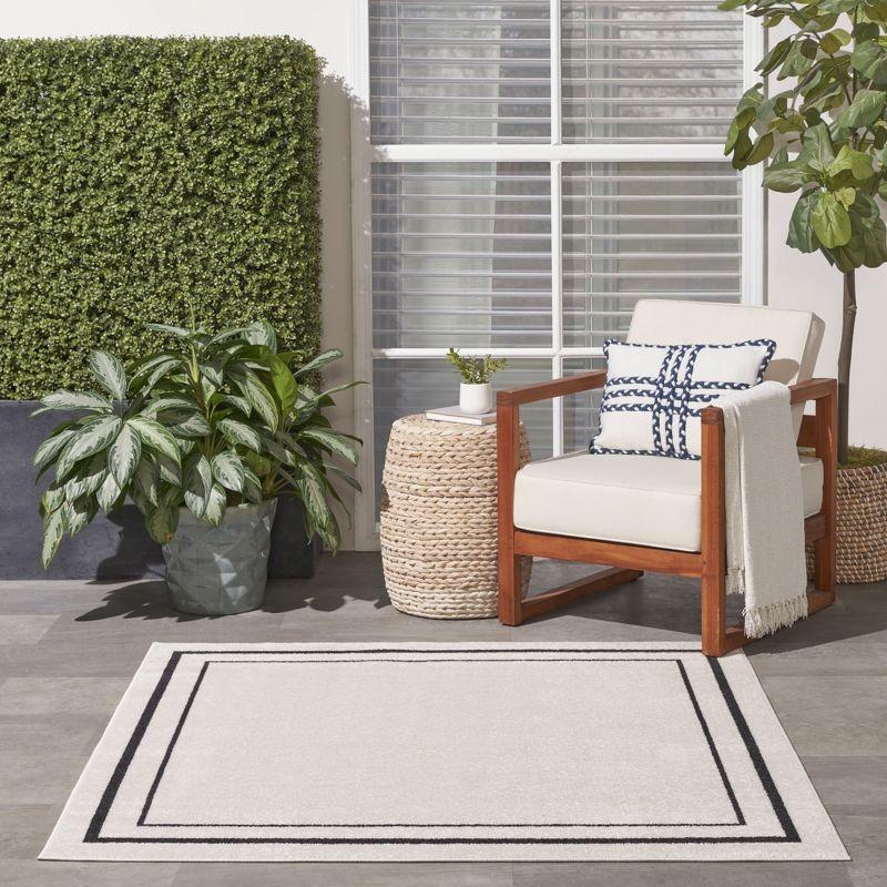 Nourison Essentials Bordered Indoor Outdoor Area Rug