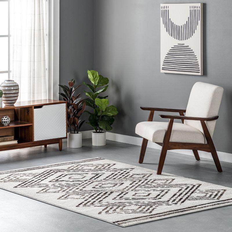 Beige and Black Geometric Synthetic Area Rug