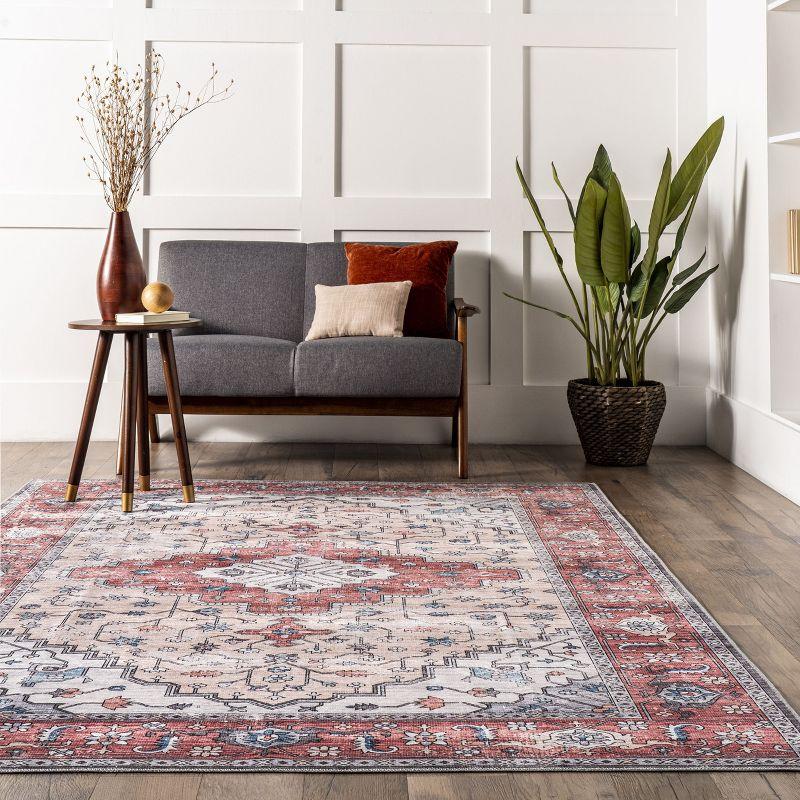 Ivory and Rust 4' x 6' Washable Synthetic Area Rug