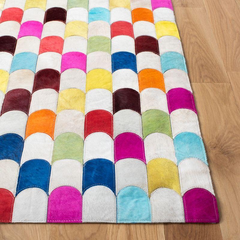 Ivory and Multicolor Geometric Cowhide Area Rug