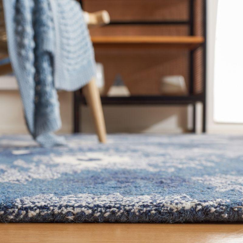 Ikat IKT652 Hand Tufted Area Rug - Blue/Ivory - 8'x10' - Safavieh.