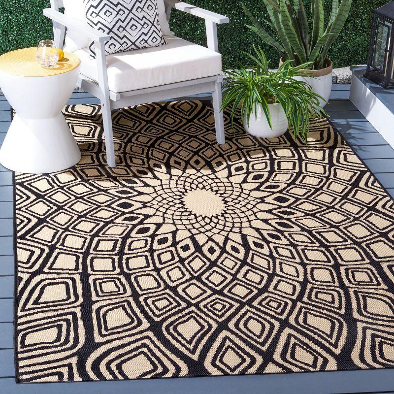 Geometric Black and Beige Synthetic Outdoor Area Rug