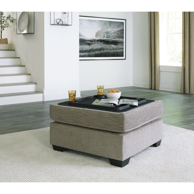 Signature Design by Ashley Creswell Upholstered Ottoman With Storage, Stone Gray