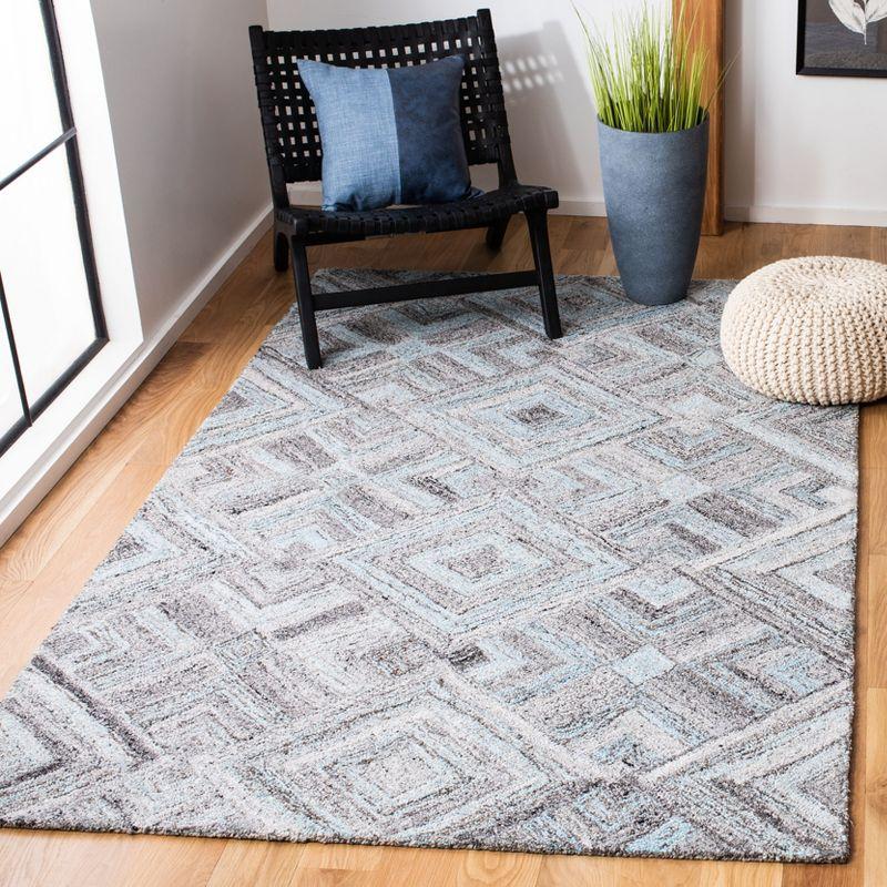 Gray and Turquoise Abstract Wool 8' x 10' Area Rug