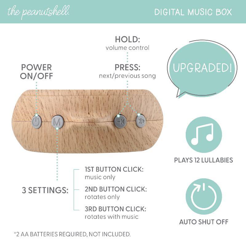 The Peanutshell Deluxe Wooden Crib Mobile Set with Arm, Music Box and Wildflower Baby Mobile, Pink