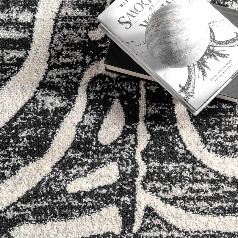 Reversible Black Zebra Stripes Synthetic Area Rug, 6'7" x 9'