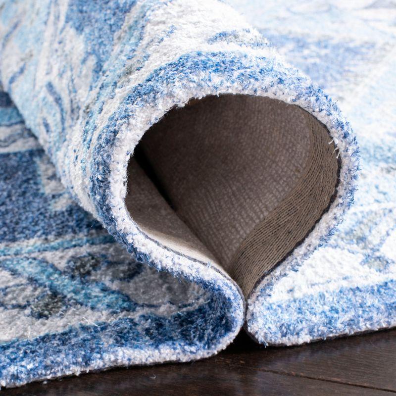 Saffron SFN549 Hand Loomed Area Rug - Blue/Ivory - 5'x8' - Safavieh.