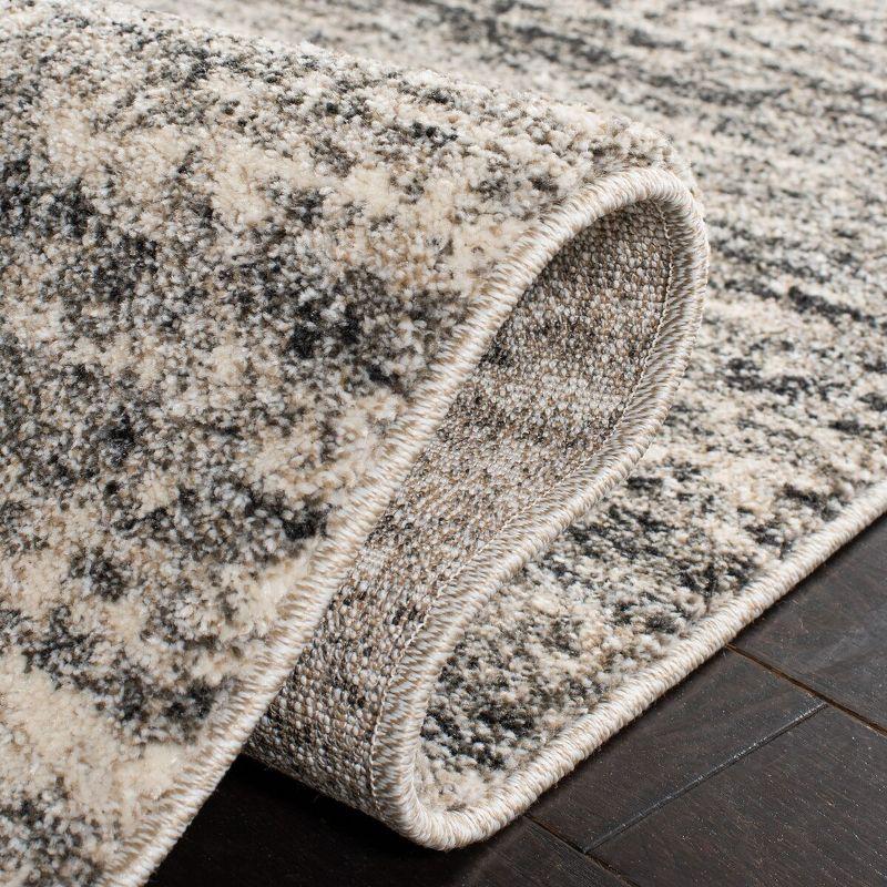 Ivory and Grey Abstract Synthetic Area Rug