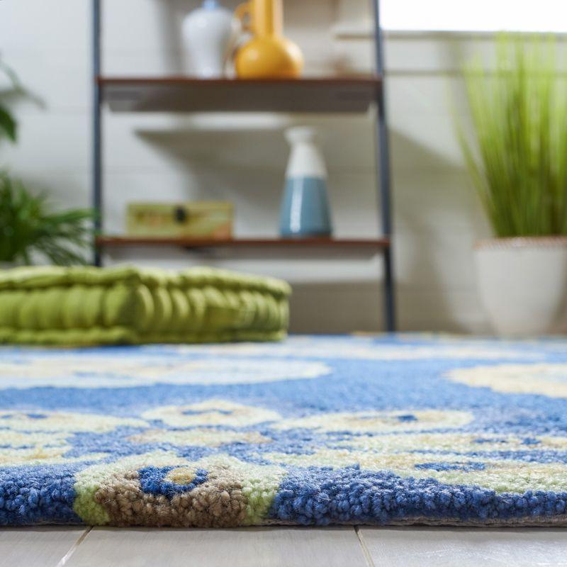 Handmade Blue Floral Rectangular Synthetic 8' x 10' Rug