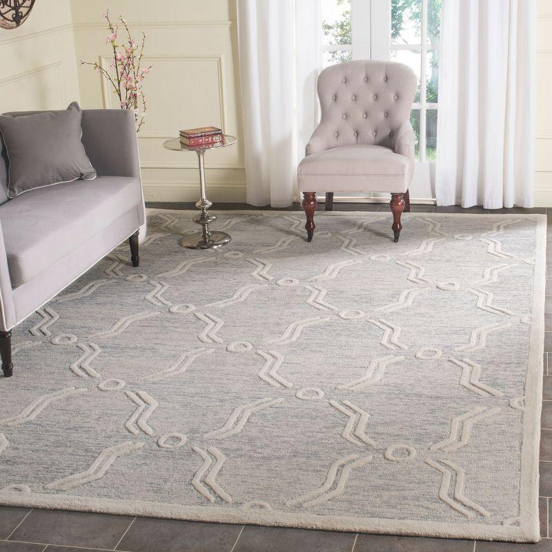 Handmade Light Grey Ivory Wool 8' x 10' Tufted Area Rug