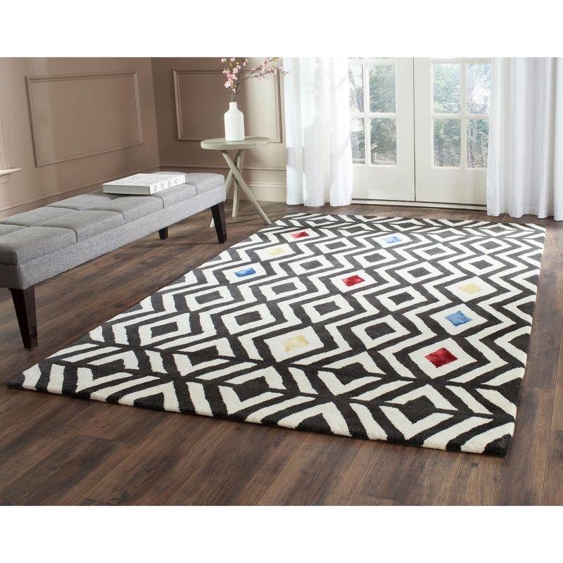 Soho SOH341 Hand Tufted Area Rug  - Safavieh