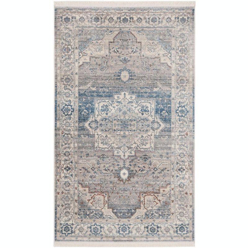 Vintage Blue and Gray Rectangular 6' x 9' Synthetic Area Rug