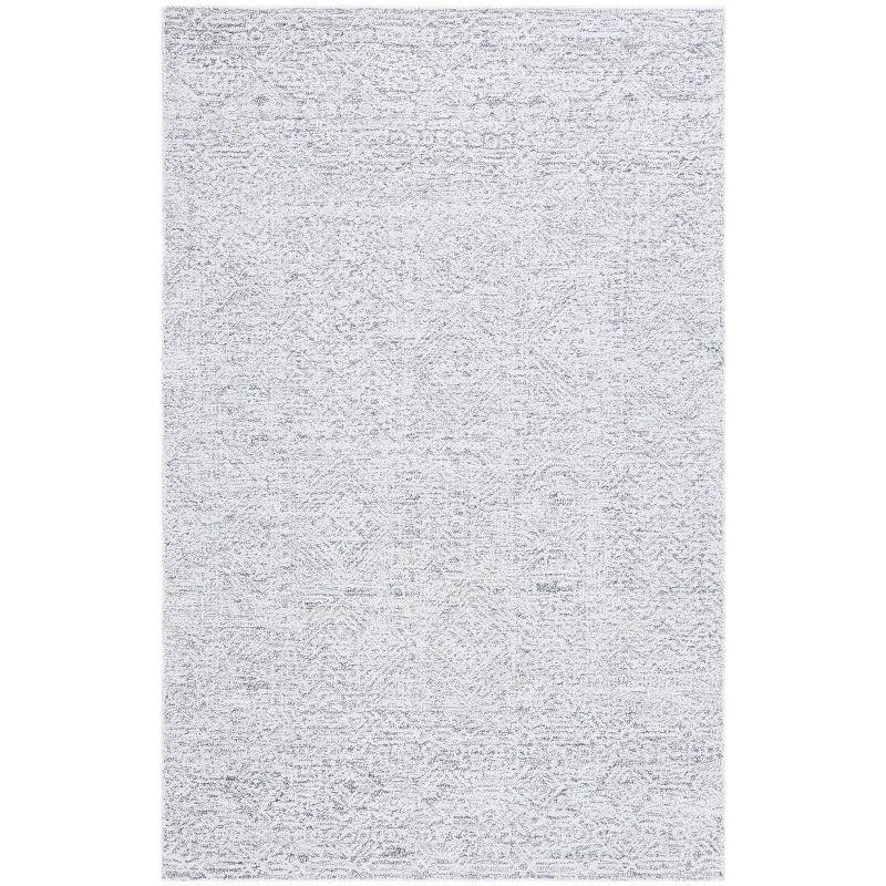 Ivory Hand Tufted Wool and Synthetic Area Rug