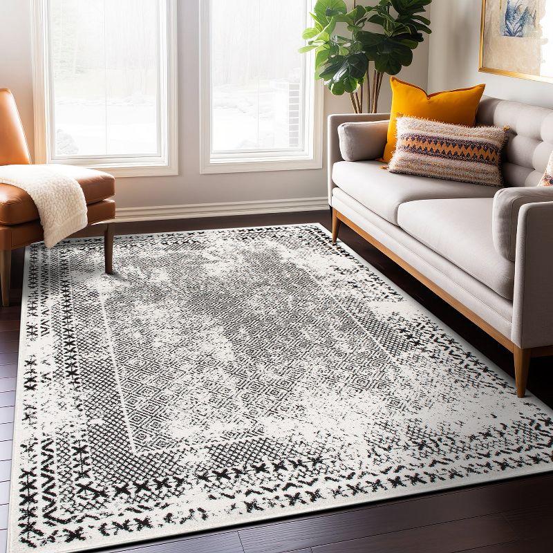 Black Geometric 5' x 7' Synthetic Easy Care Area Rug