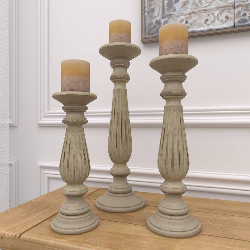 Olivia & May Set of 3 Farmhouse Mango Wood Teardrop Designed Pillar Candle Holders: Rustic Wooden Candlestick Holders