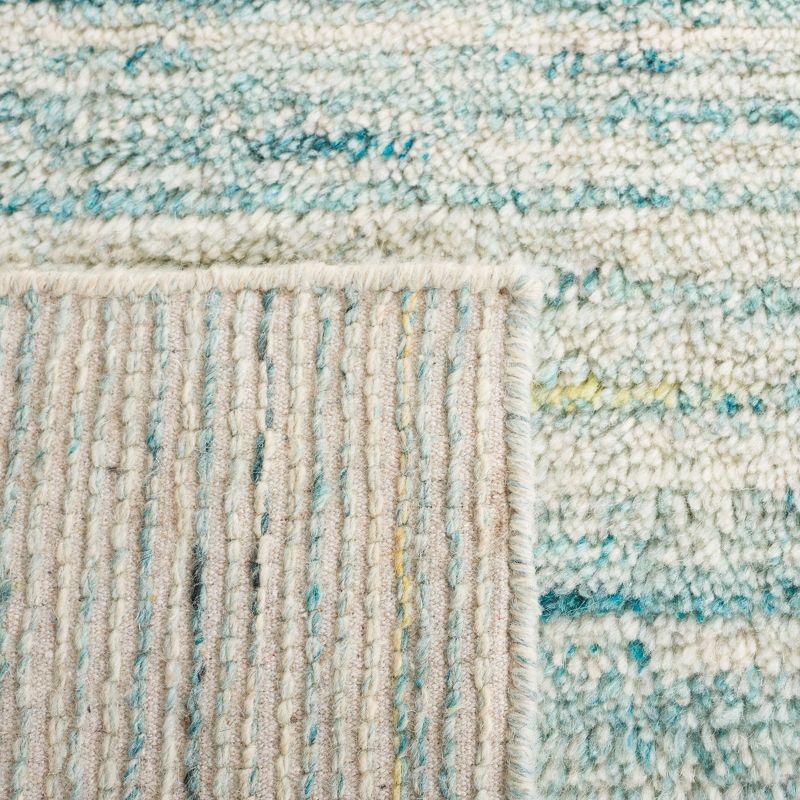 Turquoise and Ivory Handmade Wool Shag Rug, 4' x 6'