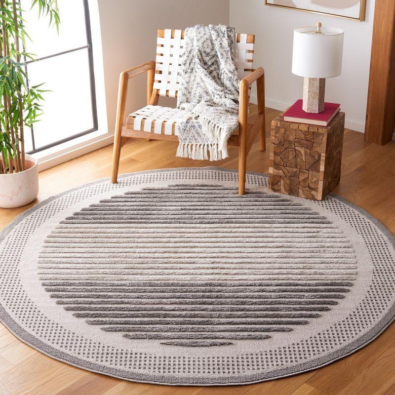 79" Round Gray Synthetic Flat Woven Geometric Rug