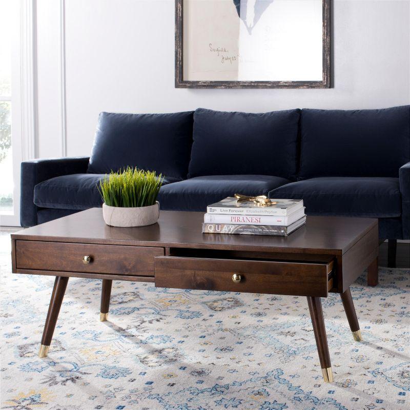 Levinson Gold Cap Coffee Table  - Safavieh