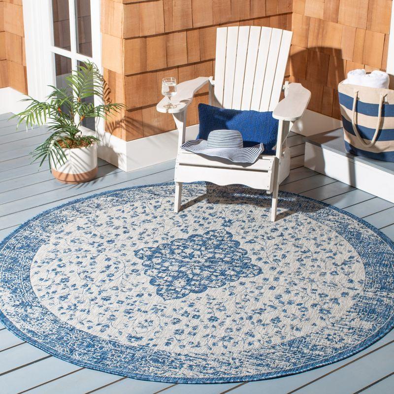 Reversible Easy-Care Blue/Grey Round Synthetic Area Rug - 6'7"