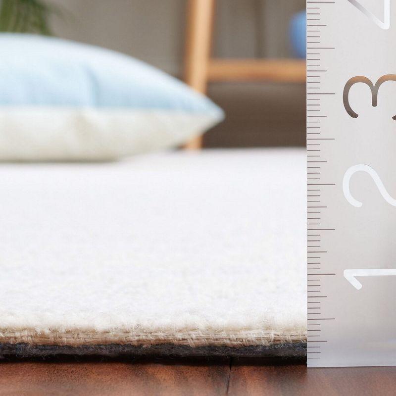 Ebony EBN353 Hand Tufted Area Rug - Light Grey/Ivory - 5'x8' - Safavieh.