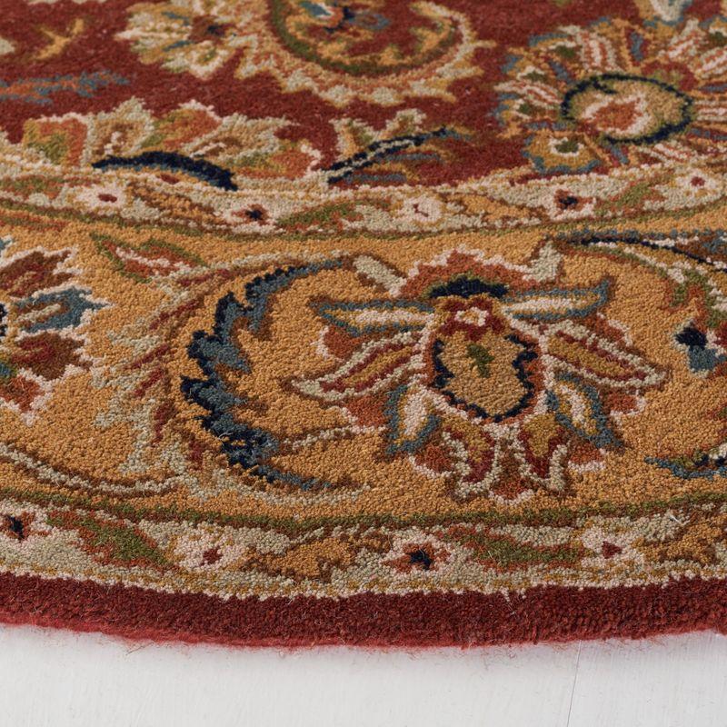 Classic CL758 Hand Tufted Area Rug - Rust/Camel - 5' round - Safavieh.