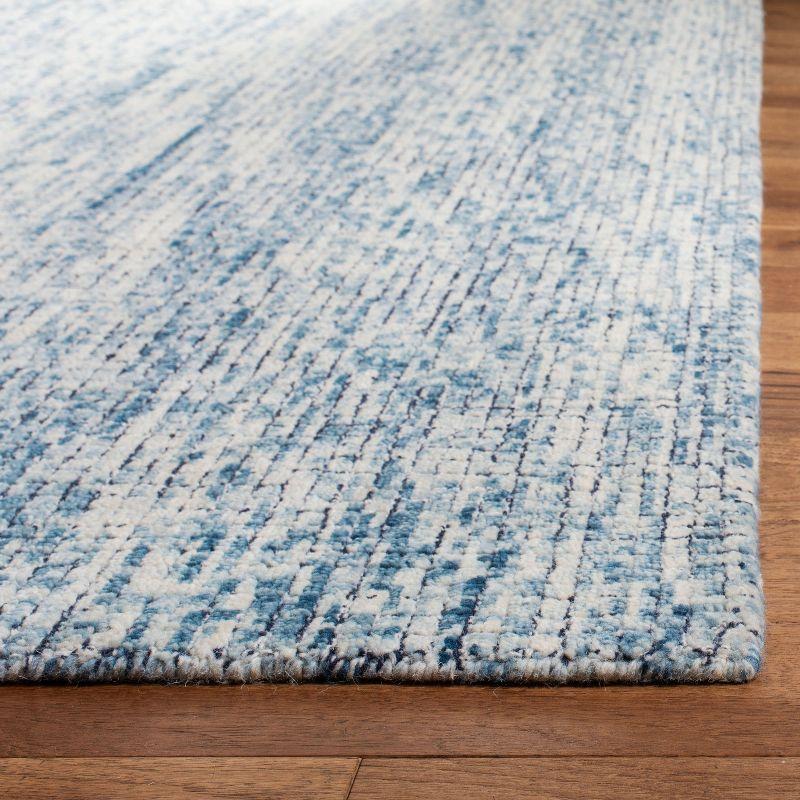 Ivory and Navy Abstract Wool Handmade Area Rug