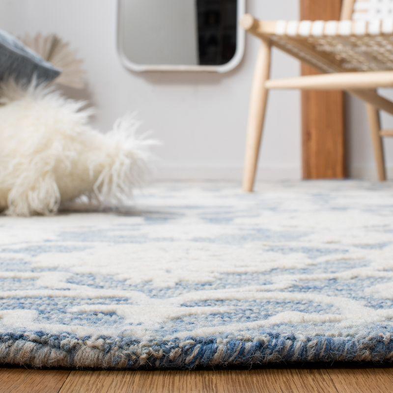 Handmade Blue Floral Wool 4' x 6' Tufted Area Rug