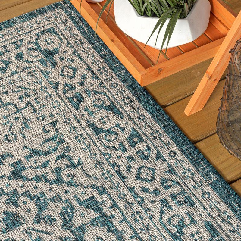 4'x6' Sinjuri Medallion Textured Weave Indoor/Outdoor Area Rug,  Teal Blue/Gray - JONATHAN Y