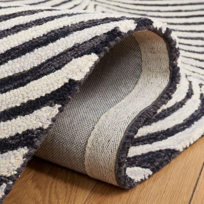 Metro MET456 Hand Tufted Area Rug - Black/Beige - 4'x6' - Safavieh.