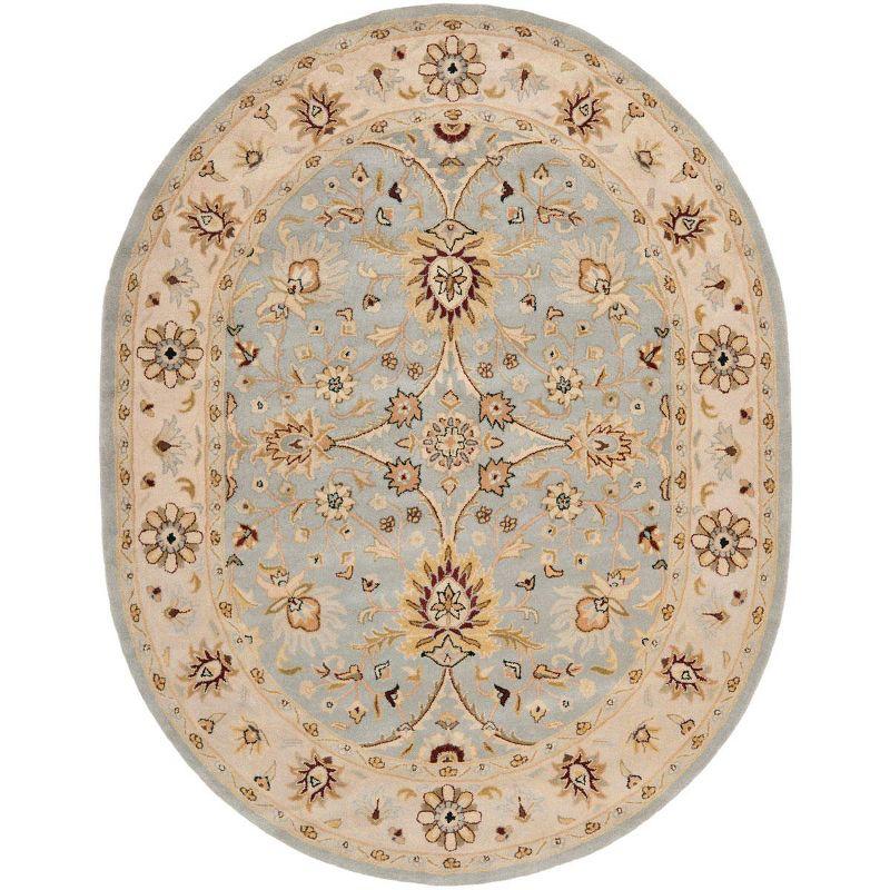 Antiquity AT249 Hand Tufted Area Rug - Light Blue/Ivory - 7'6"x9'6" Oval - Safavieh.