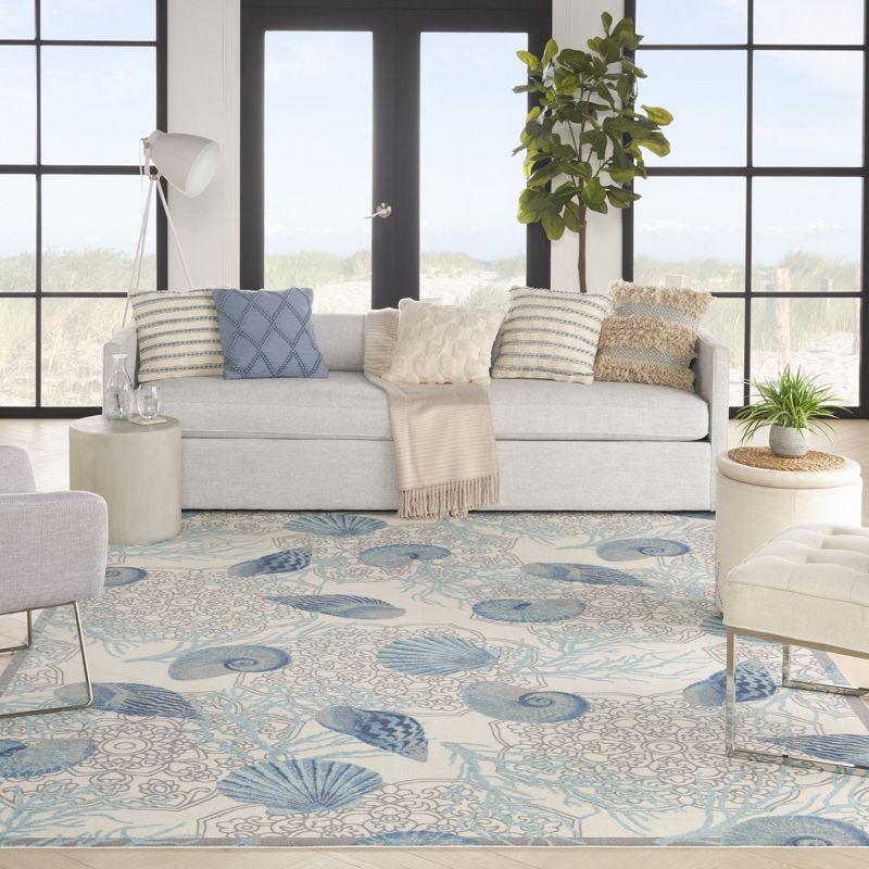 Ivory Blue Floral Synthetic Rectangular Area Rug 6'6" x 9'6"