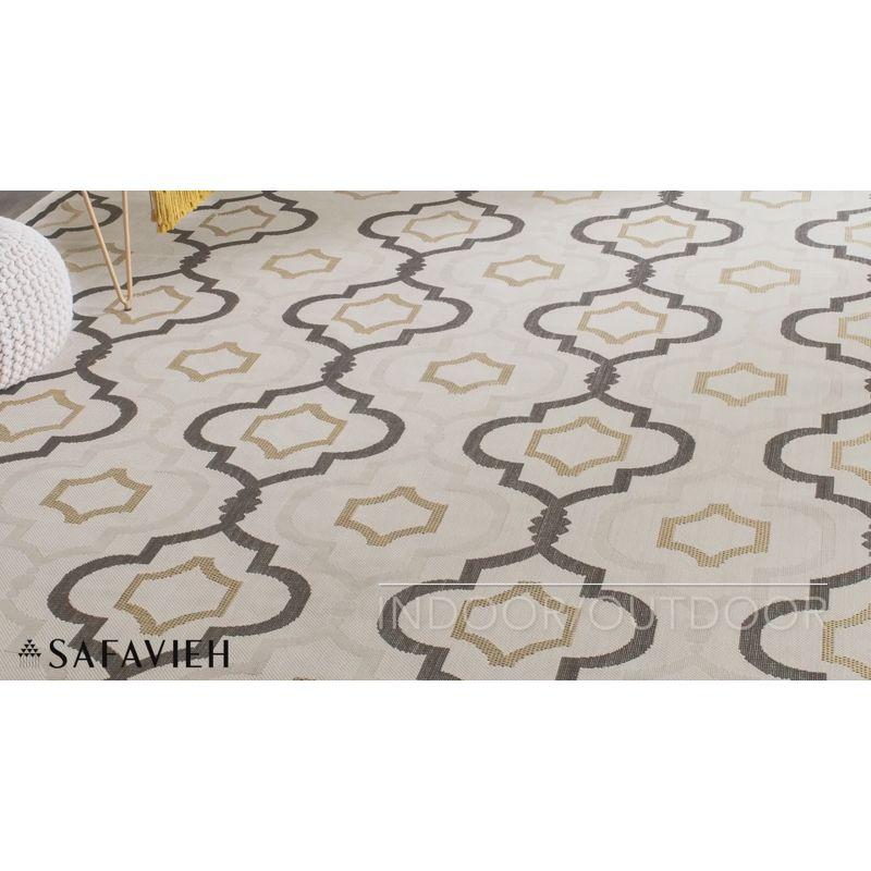 Elegant Mosaic 31'' Round Beige & Black Synthetic Indoor/Outdoor Rug