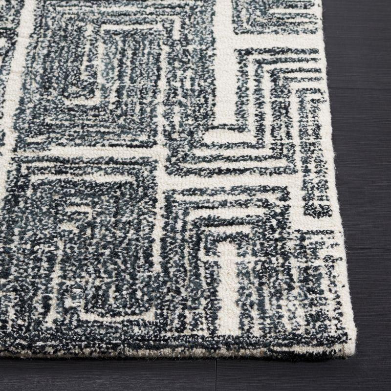 Metro MET177 Hand Tufted Indoor Area Rug - Black/Ivory - 4'x6' - Safavieh