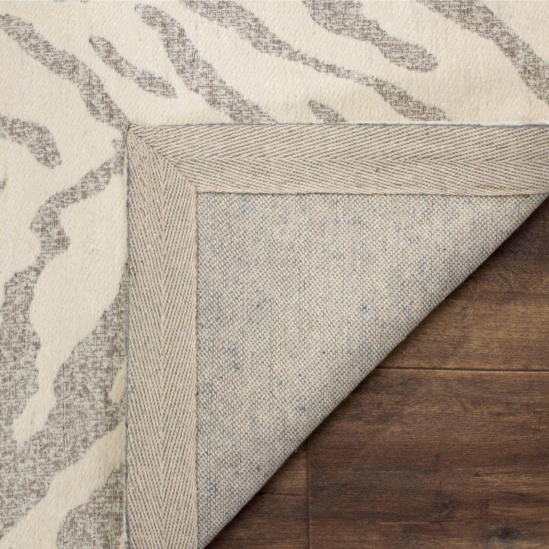 Light Grey and Ivory Rectangular Hand Loomed Area Rug