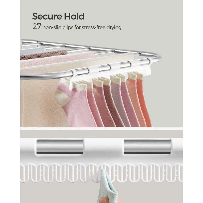 SONGMICS Foldable Clothes Drying Rack with Sock Clips Laundry Drying Rack with Height-Adjustable Gullwings