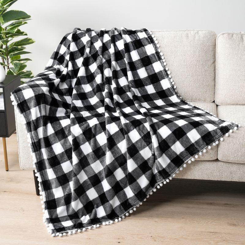 PAVILIA Fleece Pom Pom Blanket Throw for Sofa Bed, Soft Lightweight Pompom Fringe Blanket for Couch