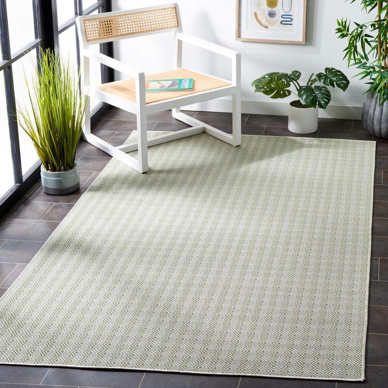 Green Geometric 4' x 6' Indoor/Outdoor Area Rug