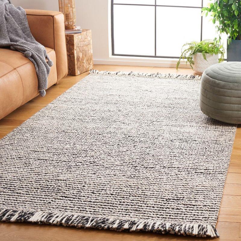 Natura 5' x 8' Black and Ivory Wool Handwoven Area Rug