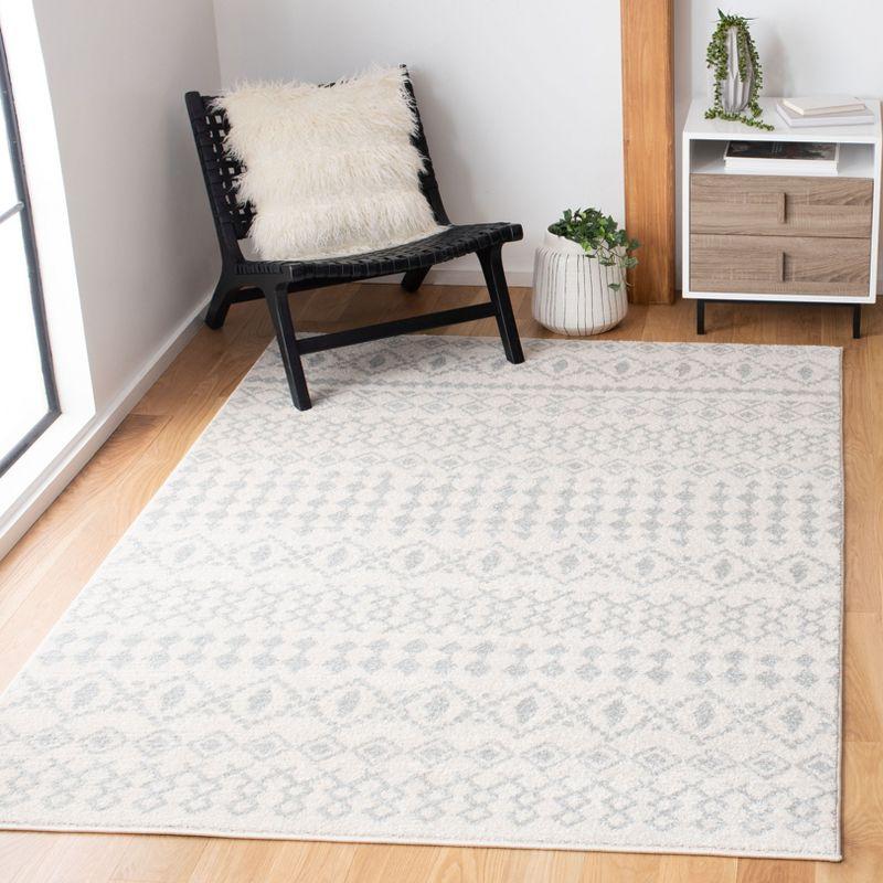 Ivory and Light Grey Round Synthetic Easy-Care Area Rug