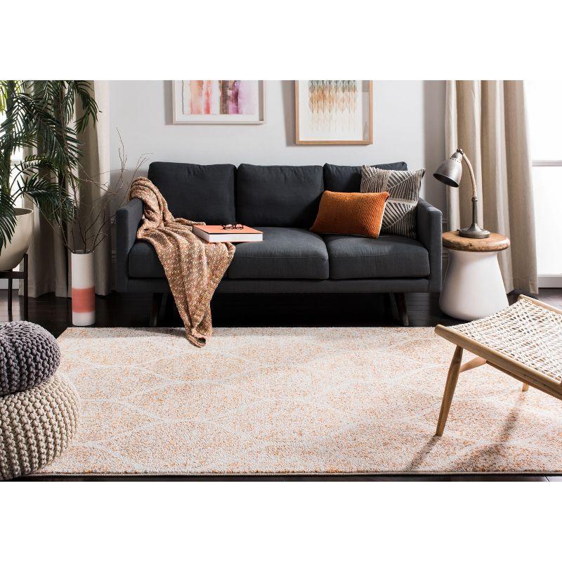 Cream/Orange Easy-Care Synthetic 9' x 12' Area Rug