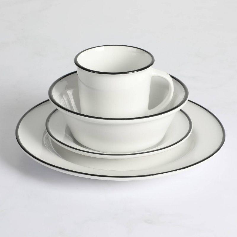 16-Piece White Porcelain Dinnerware Set with Black Trim