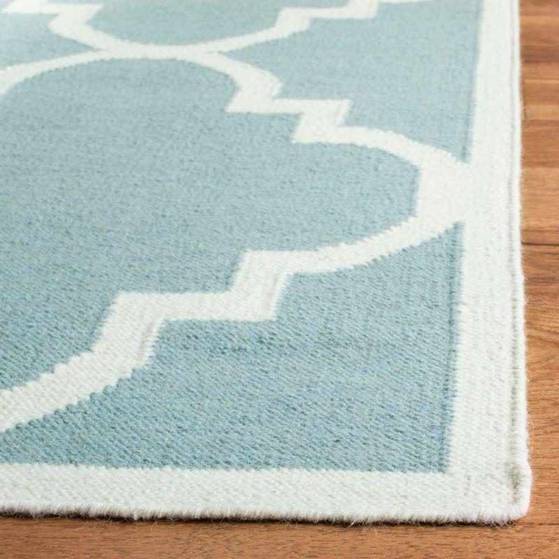 Ivory and Light Blue Geometric Wool Area Rug, 6' x 9'